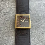 Roxy Womens Watch 33MM Gold Tone Square Case Brown Leather Cuff Band A14 Pre-owned. Price: $19.16.