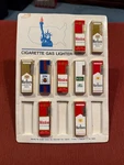Vintage Cigarette Display 9 Lighters Marlboro Winston Kool Miller Lite Used. Price: $95.00.
