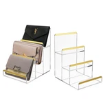 Pack 3-TIER Purse Display Stands, Acrylic Wallet Holder Risers Stand, 2-INC... New. Price: $51.39.